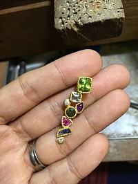 final pendant with gemstones to represent each family member