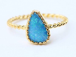 hand crafted australian opal ring in 18k gold setting available in chiang mai thailand