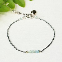 dainty silver bracelet with aquamarine beads